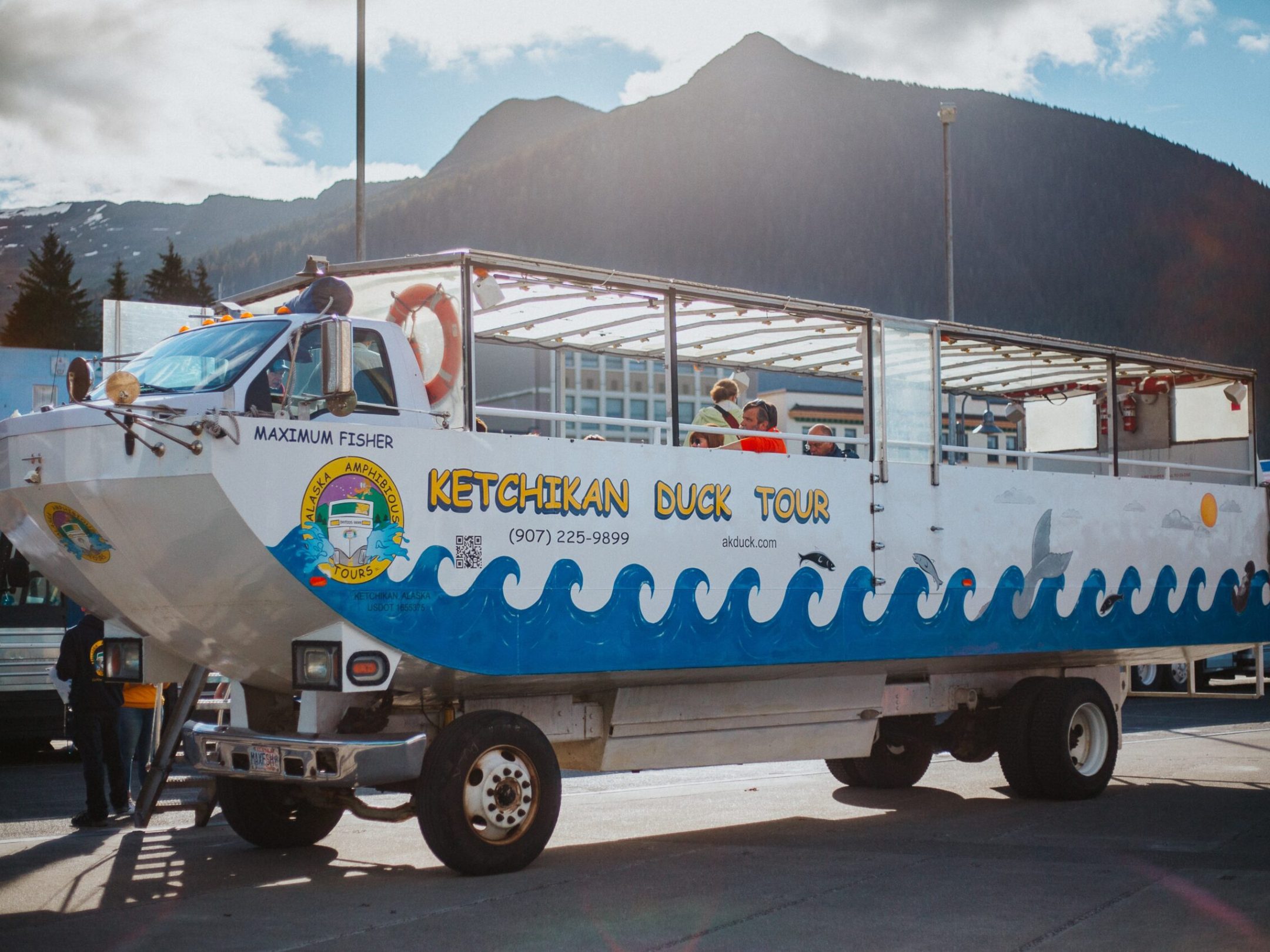 a truck with a mountain in the background